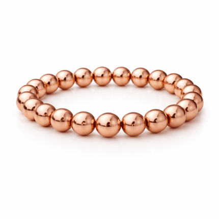 Roségold hematit ásvány karkötő fényes rózsaarany színű gyöngyökkel fehér háttéren